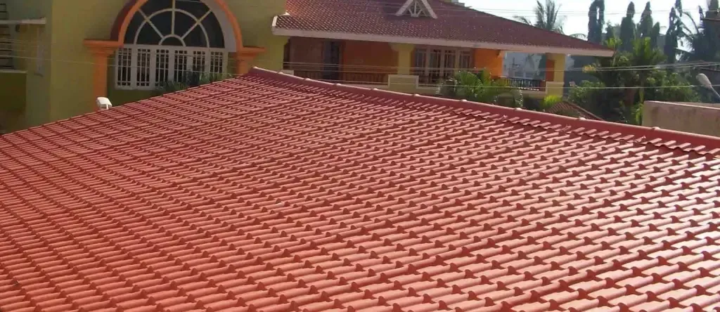 A close up of a vibrant red tiled roof A close up of a vibrant red tiled roof