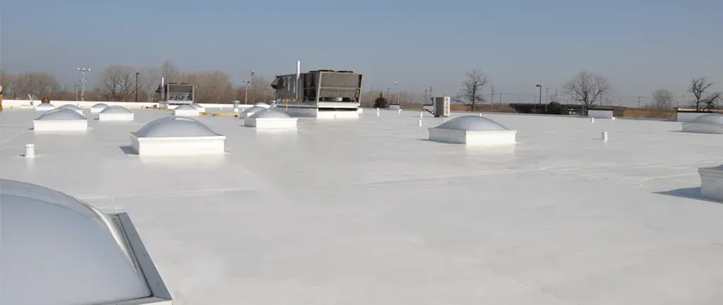 Flat commercialrooftop with multiple skylights Flat commercialrooftop with multiple skylights